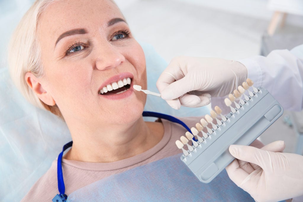 Older woman patient gets fitted for veneers